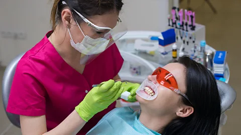 Igor Kardasov/Alamy Professional teeth whitening treatments are often more powerful than those used at home (Credit: Igor Kardasov/Alamy)