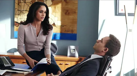 Alamy In cult US TV series Suits, Meghan Markle plays Mike Ross' (Patrick J. Adams) girlfriend, lawyer Rachel Zane (Credit: Alamy)