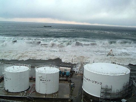 An image of the 2011 tsunami taken from the Fukushima No 1 nuclear power plant. Giant waves are advancing towards the power plant.