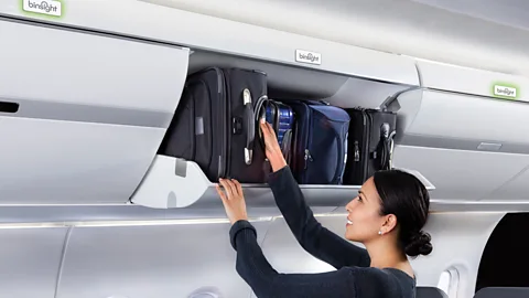 Crystal Cabin Awards Simple but effective: monitors use a traffic light system to let passengers and crew know if there is space in an overhead compartment (Credit: Crystal Cabin Award)