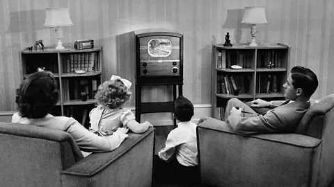 Getty Images The 1940s and 50s brought entertainment into the living room, with new technology making it the lively hub of the modern home (Credit: Getty Images)