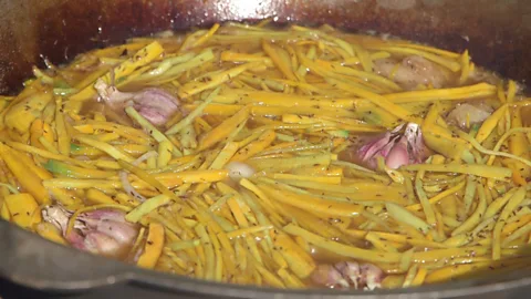 Amanda Ruggeri A pot of simmering ingredients for osh palav (Credit: Amanda Ruggeri)
