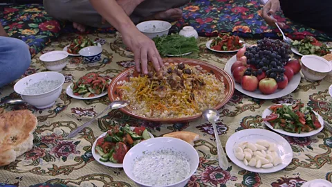 Amanda Ruggeri Eating oshi palav (Credit: Amanda Ruggeri)