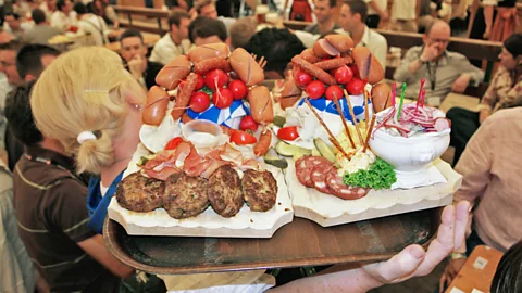 Pat Behnke/Alamy Sausages are always on the menu at German beer halls, or Biergartens (Credit: Pat Behnke/Alamy)