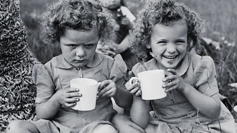 Alamy Happy and sad twins (Credit: Alamy)