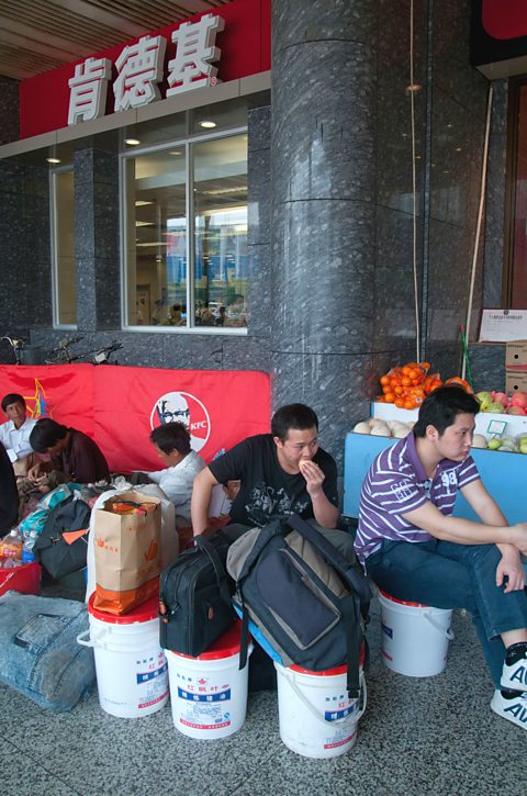 Migrant workers from the countryside at Guangzhou train station, Guangdong province