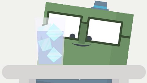  Square character looking at a glass of ice. 