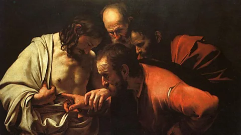 Alamy Caravaggio used cochineal as an essential element of his style, creating a dramatic contrast in The Incredulity of Saint Thomas, created in 1601-2 (Credit: Alamy)