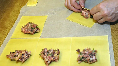 blickwinkel/Alamy The pasta dough is stuffed with the meat-and-cheese mixture, sealed shut and either boiled in broth or sautéed in butter (Credit: blickwinkel/Alamy)