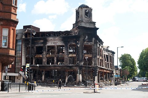 A burnt-out building in Tottenham after rioting on 8 August 2011