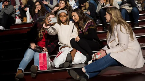 Drew Angerer/Getty Images Generation Z - those born around 2000 or later - were born with social media. They will bring these skills into the workforce (Credit: Getty Images)