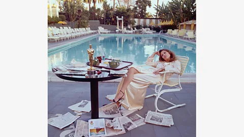 Getty Faye Dunaway received the best actress award for Network – a newspaper nearby indicates that her co-star Peter Finch won the first posthumous best actor Oscar (Credit: Getty)