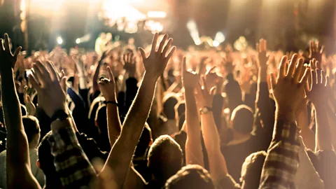 Getty Images The logic of moshpit behaviour keeps fans from being trampled at music gigs (Credit: Getty Images)