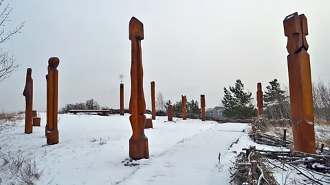 Will Mawhood The Žemaitiu alka shrine features a wooden figure dedicated to Austėja, the pagan goddess of bees (Credit: Will Mawhood)