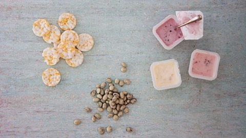 Unhealthy low-fat snacks: salty rice cakes, coated raisins and sugar-laden yoghurt.