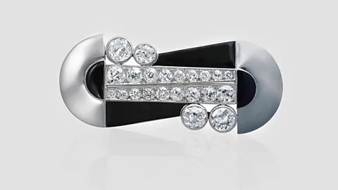 Christie's A diamond-and-lacquer brooch by Raymond Templier typifies the bold, graphic look of the era (Credit: Christie's)