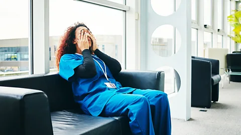 Getty Images DDI data suggest workers who go along with a promotion are three times more dissatisfied with their new role and more likely to consider leaving (Credit: Getty Images)