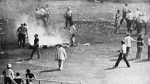 Associated Press Rock fans brought disco records to be destroyed in an explosion at a Chicago White Sox game in 1979 – 30 people were injured from the blast (Credit: Associated Press)