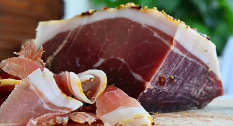 Getty Images Salting the outside of the meat draws out moisture, making it harder for bacteria to survive (Credit: Getty Images)