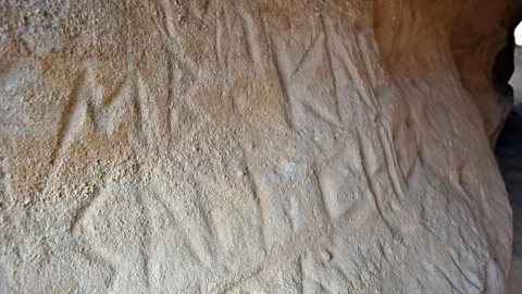 Sara Toth Stub Writing and other marks left behind by ancient miners are still visible on the rock walls (Credit: Sara Toth Stub)