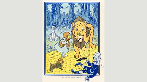 Alamy Dorothy Gale meets the Cowardly Lion in William Denslow’s illustration for L Frank Baum’s book (Credit: Alamy)