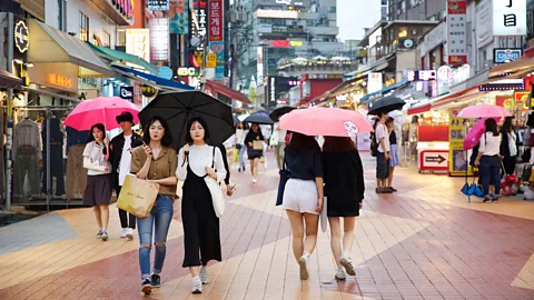 Alamy Rapid social and economic changes in countries like South Korea and Singapore have upended social norms, says National University of Singapore professor Jean Yeung (Credit: Alamy)