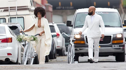 Solange Knowles wore a backless white jumpsuit when she married Alan Ferguson in 2014, and the couple arrived at their wedding on bicycles (Alamy)