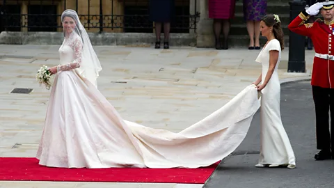 Alamy The Duchess of Cambridge wore a lace wedding dress by designer Sarah Burton for McQueen (Credit: Alamy)