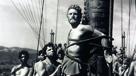 Alamy Kirk Douglas played Ulysses in the 1954 film based on Homer’s epic – in this scene, he listens to the song of the Sirens while strapped to a ship’s mast (Credit: Alamy)