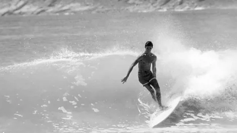 Alamy Freedom from the restrictions of the conservative, capitalistic, suburban US as represented by the Eisenhower ‘50s was shown in the surfing film Endless Summer (Credit: Alamy)