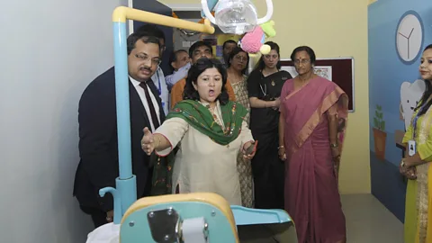 Getty Images State officials at a government district hospital in Uttar Pradesh. Across industries and income levels, government jobs in India are hard to come by (Credit: Getty Images)