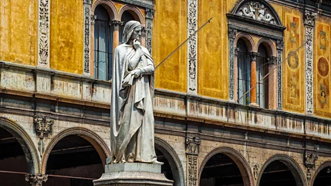 Alamy Depictions of Dante are found all over Italy, as with this statue in Verona, but Florence did not pardon him for the alleged crimes that exiled him until 2008 (Credit: Alamy)