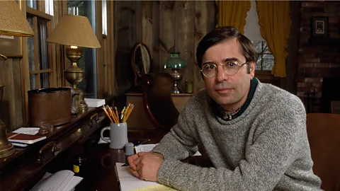 Ira Wyman/Getty Images Young Paul Theroux sits at his writing desk