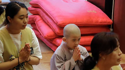 Getty Images Buddhist monks do not seem to have the typical self-defensive reactions to reminders of death, bucking the predictions of ‘terror management theory’ (Credit: Getty Images)