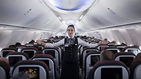 Getty Images Cabin crew have to maintain an air of friendliness even when faced with abusive or combative passenger behaviour (Credit: Getty Images)