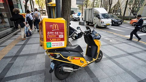 SFL Travel/Alamy In 2007, McDonald’s assembled its own fleet of scooters to compete with other South Korean food delivery services (Credit: SFL Travel/Alamy)