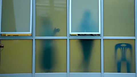 Getty Images People are pictured at the Chiang Rai hospital where the boys have been brought after their ordeal (Credit: Getty Images)