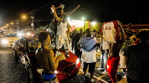 Getty Images Dancers at a 2016 Black Lives Matter protest; Shamell Bell has led workshops presenting street dance as an alternative strategy for radical social change (Credit: Getty Images)