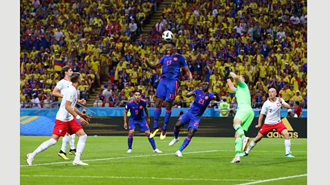 Getty Images Yerry Mina of Colombia scores his team's first goal of the World Cup 2018 at Kazan Arena on 24 June (Credit: Getty Images)