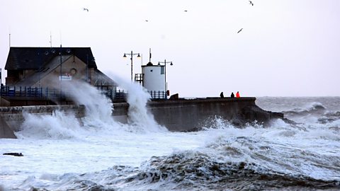 Massive waves crash into the seafront at PorthCawl in Wales.