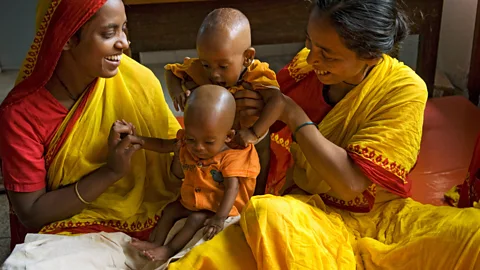 Alamy The cooperation of local families in areas such as Dhaka has been essential for the long-term studies of malnutrition (Credit: Alamy)