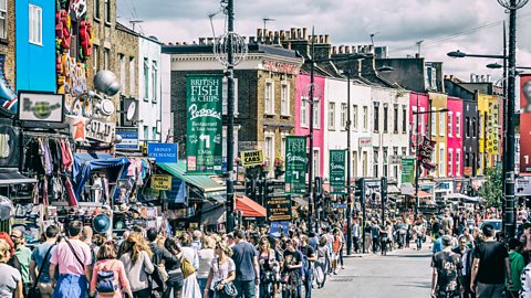 Shoppers walking in busy street in London