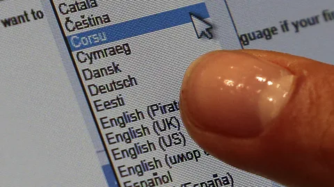 Getty Images Facebook's interface is now available in over 100 languages. And on their personal profiles, many people try to project a multilingual flavour (Credit: Getty Images)