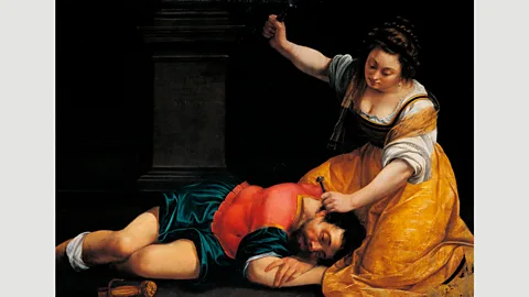 Getty Gentileschi’s works, such as Jael and Sisera, 1620, feature much graphic violence against men (Credit: Getty)