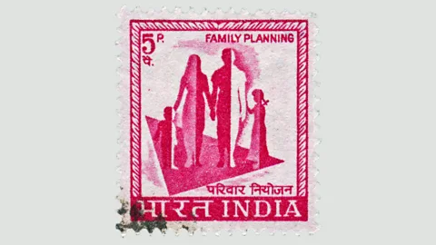 Getty A cancelled stamp promotes  for India’s family planning policies (Credit: Getty)