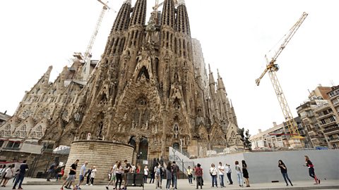 People standing outside the Sagrada Familia.