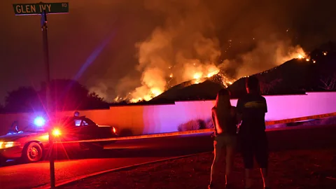 Robyn Beck/AFP/Getty Images Onlookers observe the so-called Holy Fire in California in August 2018 (Credit: Robyn Beck/AFP/Getty Images)