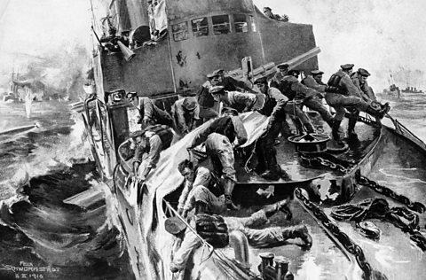 Sailors on a German destroyer attempting to repair the damage on the ship