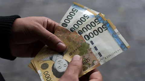 Getty Images Intensive driving course packages start at around 8,800 yuan ($1,280) and involve helping clients through the process with a bit of sightseeing thrown in (Credit: Getty Images)