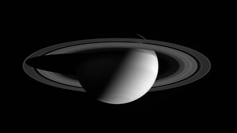 A monochrome photo of Saturn